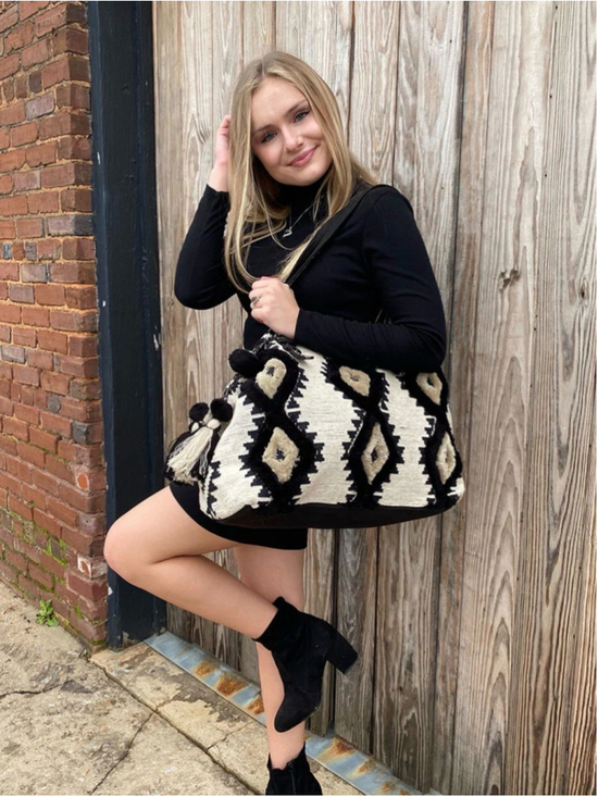 America & Beyond Handbags - Boho Woven Black and Cream Weekender with Tassel Accents